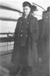"CQD" Jack Binns shortly after his rescue from the Republic.  Capt. Sealby (wearing cap) in background.
